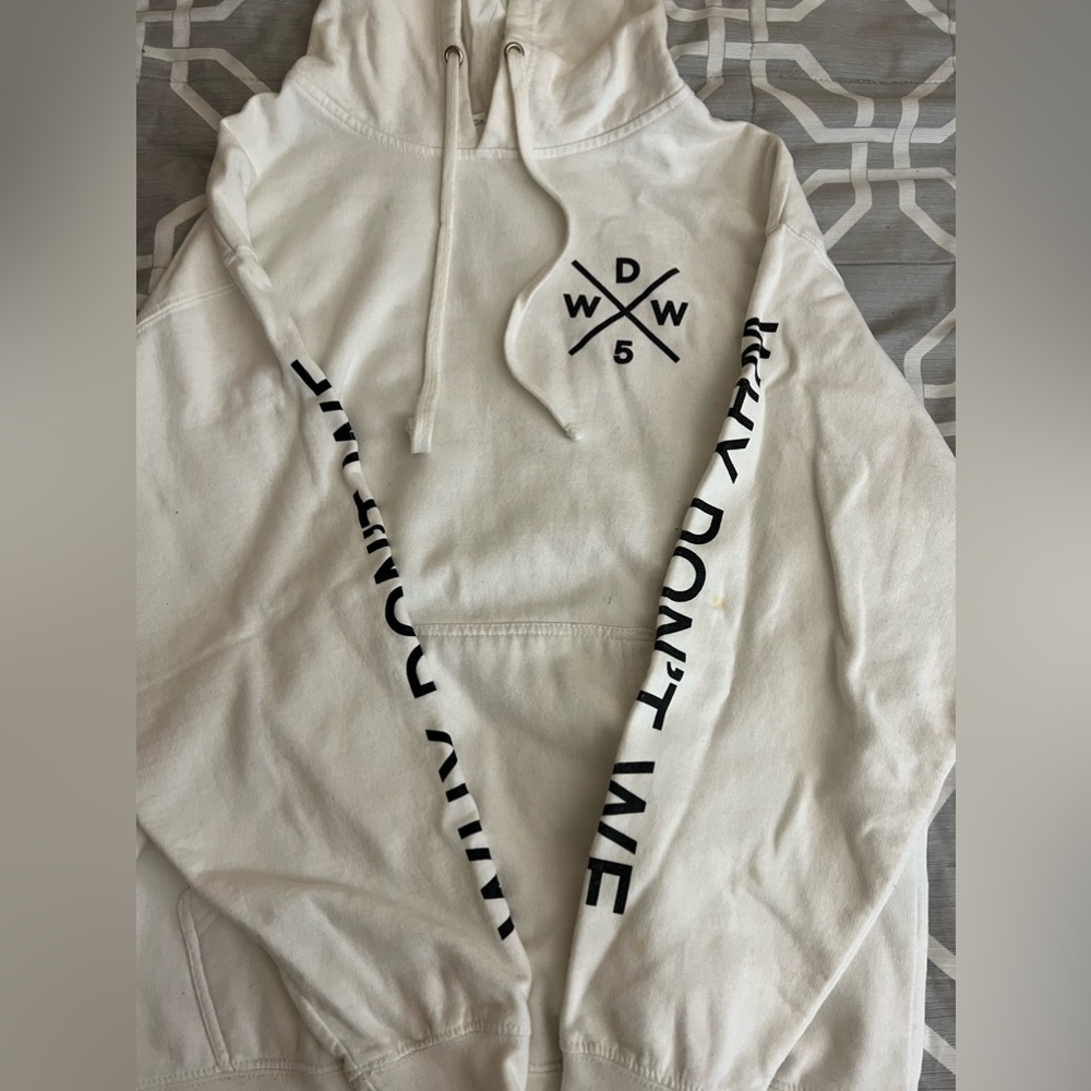 A “Why Don’t We” white hoodie